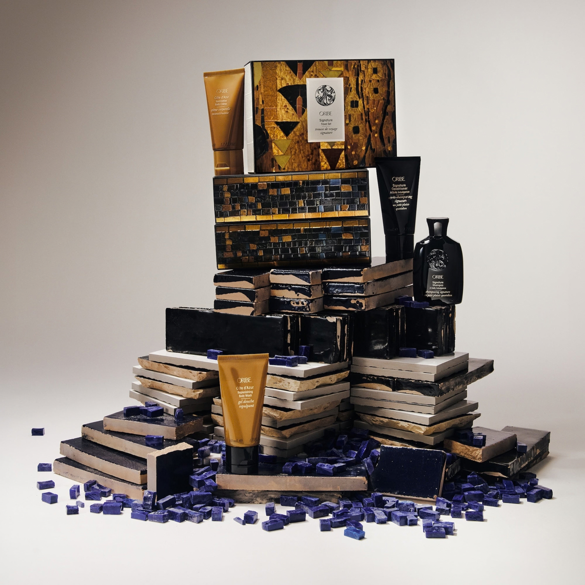 Oribe Signature Travel Gift Pack to restore shine and softness to skin and hair 