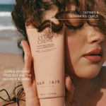 Nak Signature Curl Trio with curl creme to define and separate curls 