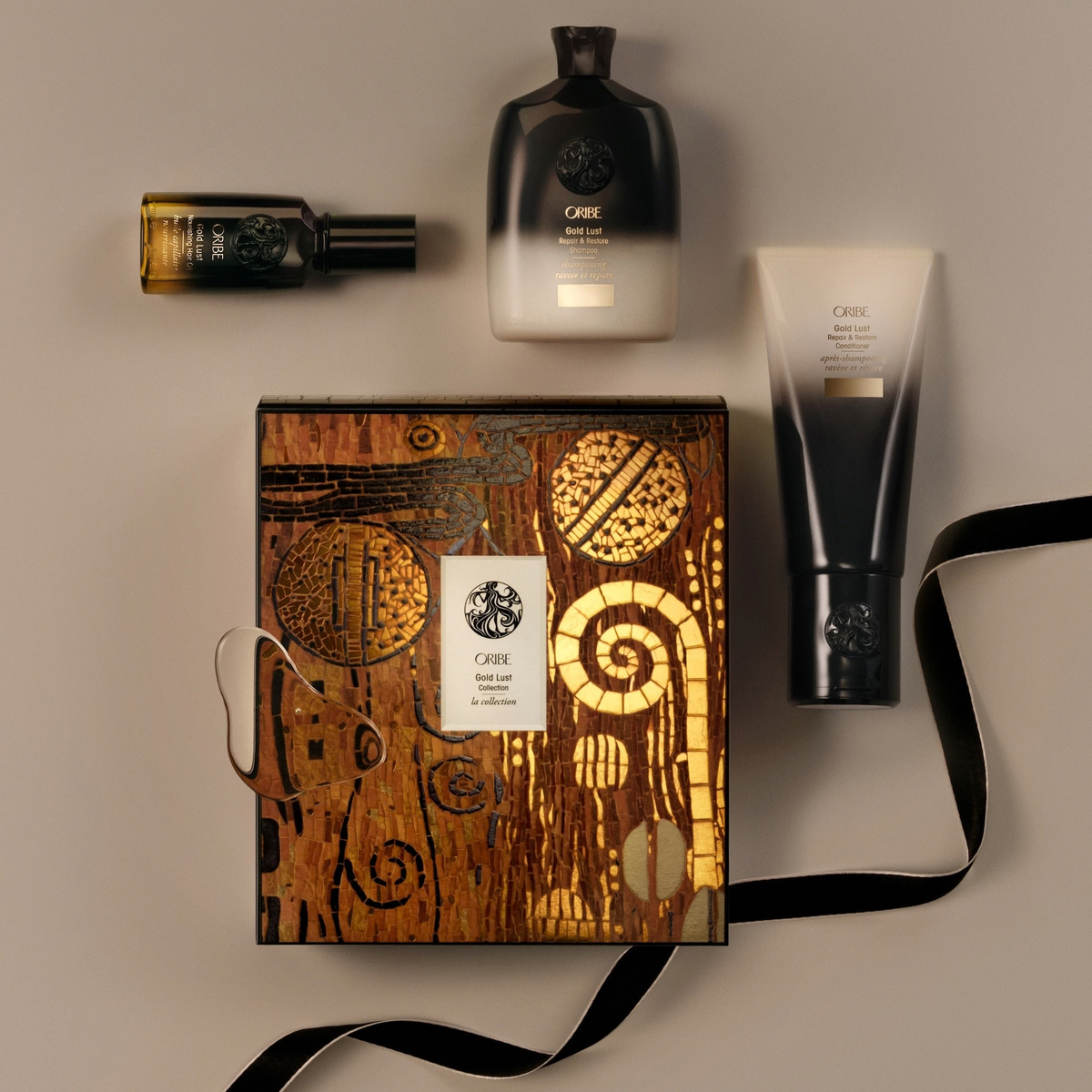 Oribe Gold Lust Repair & Restore Trio to restore and hydrate hair