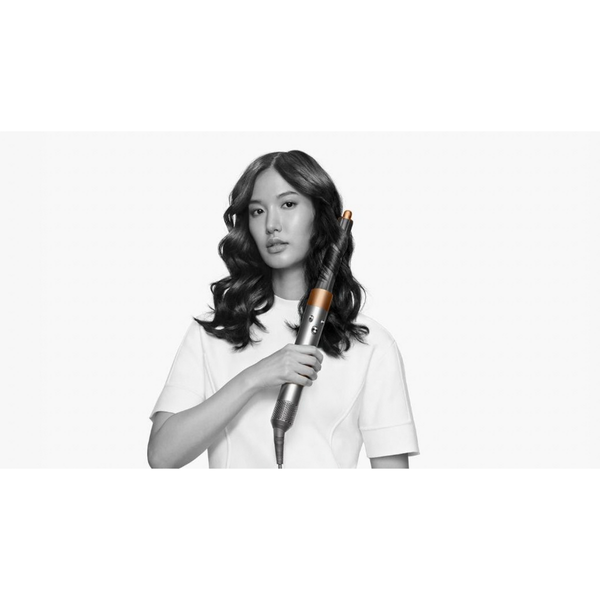 Dyson Airwrap™ Multi-styler and Dryer Complete Long in Bright Nickel/Rich Copper for curls and waves.