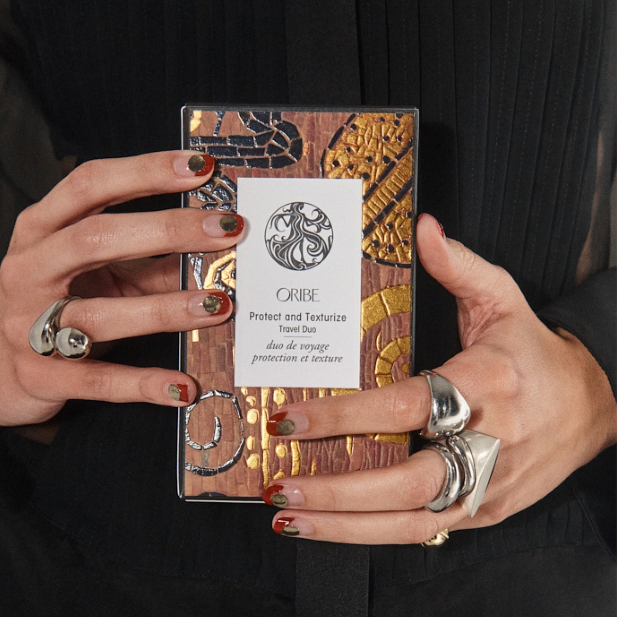 Oribe Protect & Texturize Travel Duo to create volume and texture in hairstyles